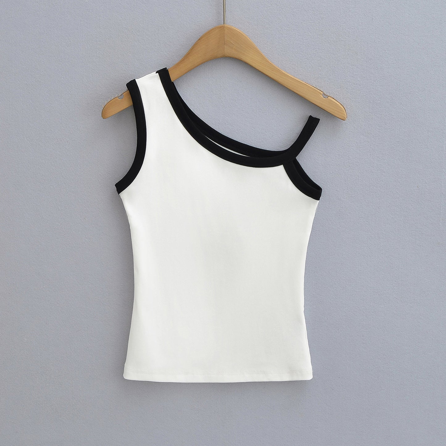 Slanted shoulder strap sleeveless vest